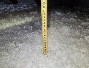 Zateplení stropu bytového domu pomocí foukané izolace